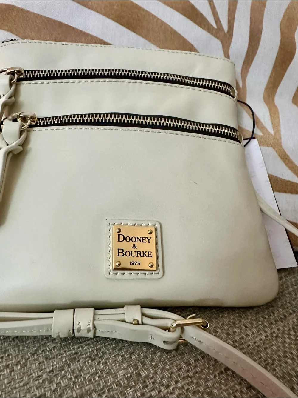 Dooney & Bourke Cream Triple-Zip Leather Crossbody